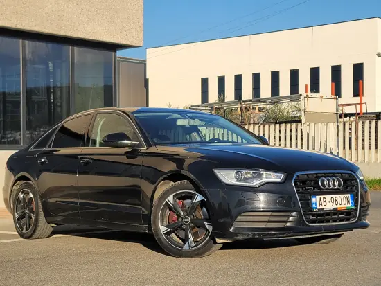 Noleggia una Audi A6 dell'anno 2011 a Tirana